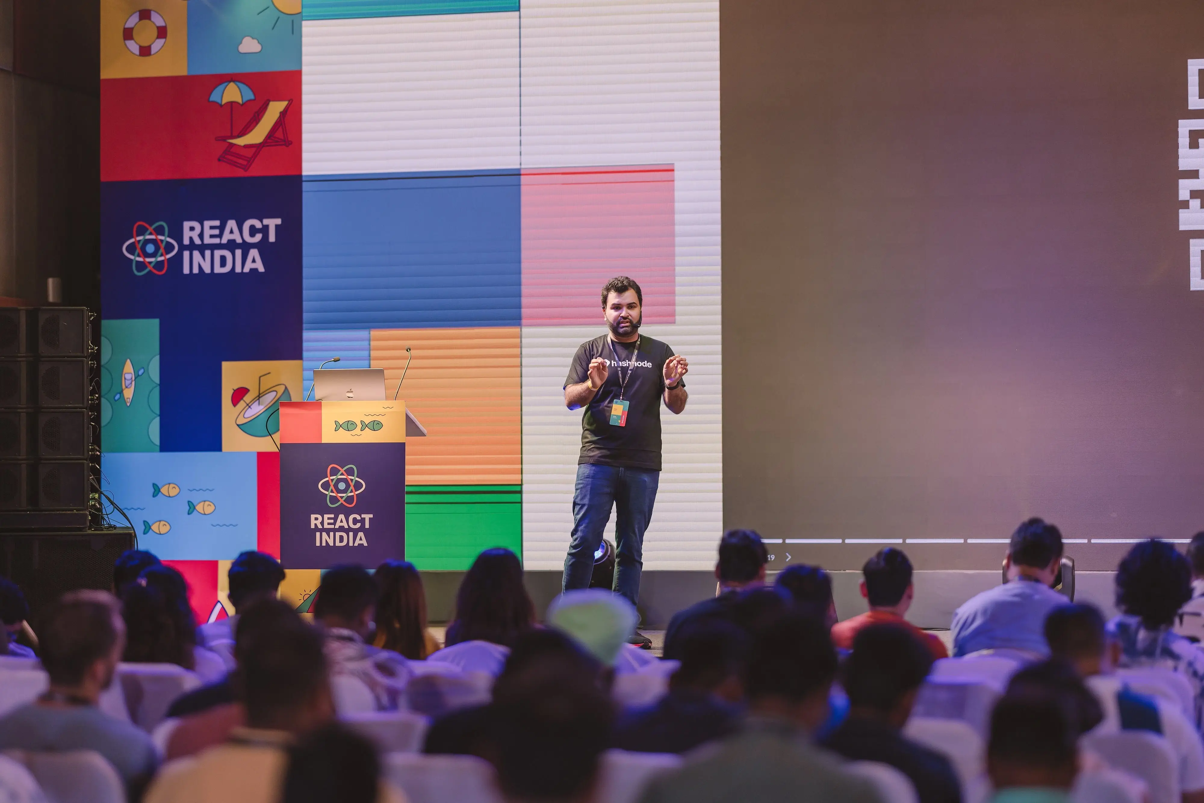 Rajat on stage at React India