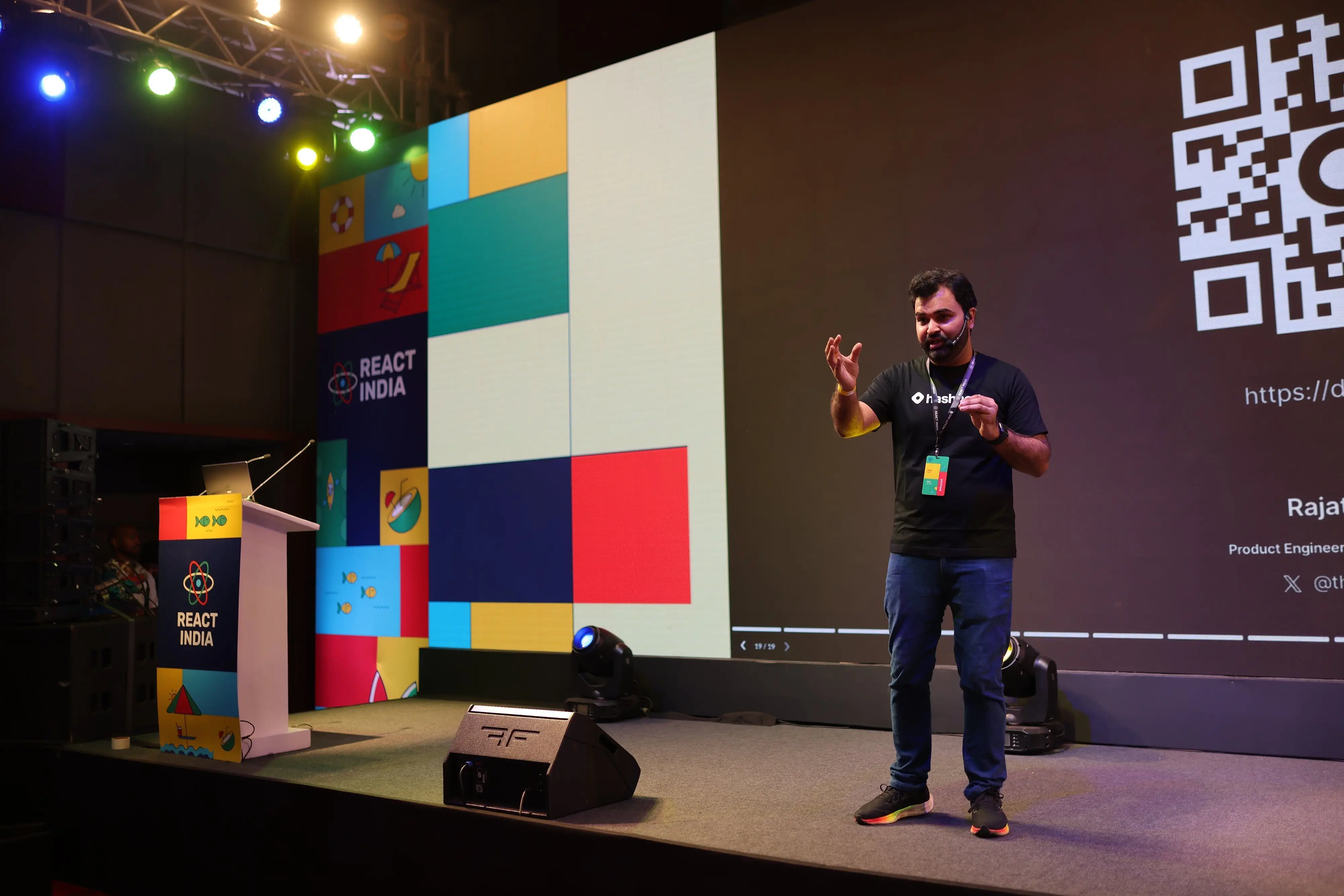 Rajat on stage at React India